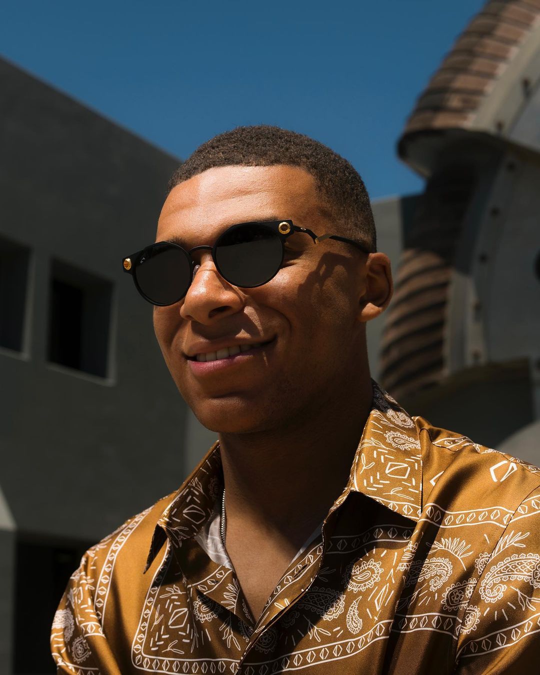 Kylian Mbappe wears Oakley shades