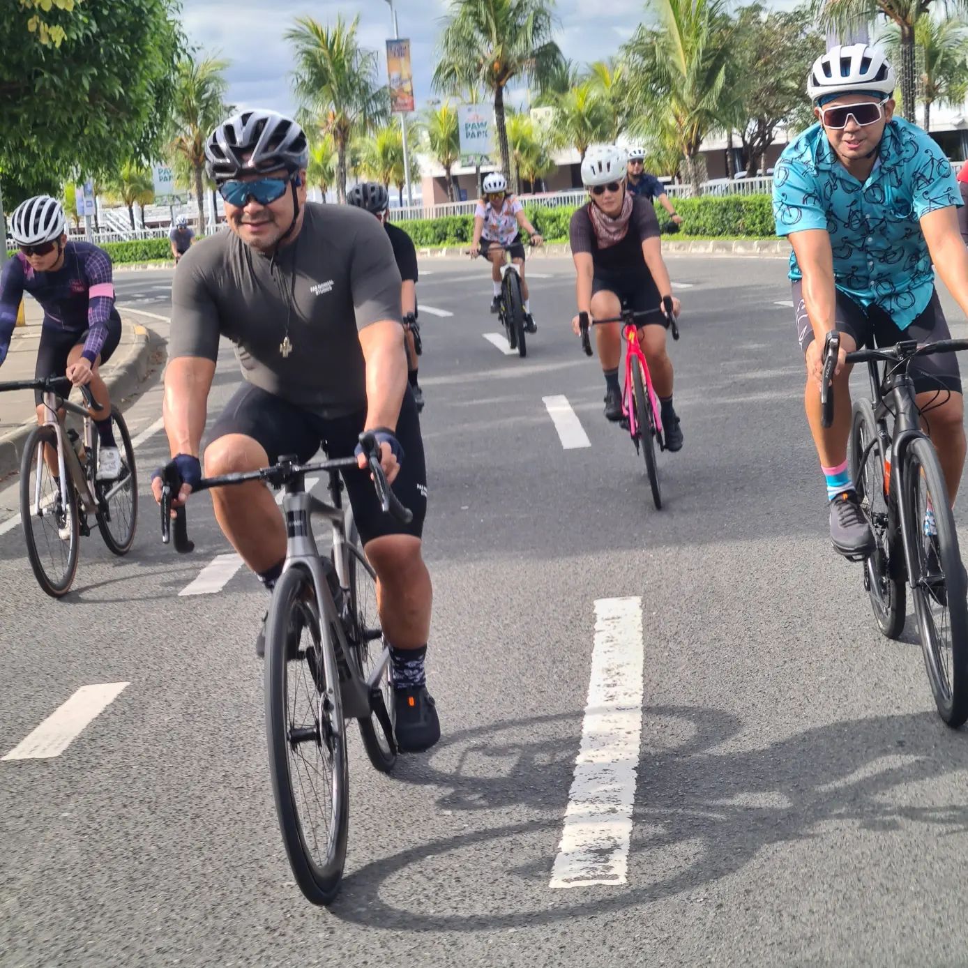 a group of people cycling taken by San Ride Bukas