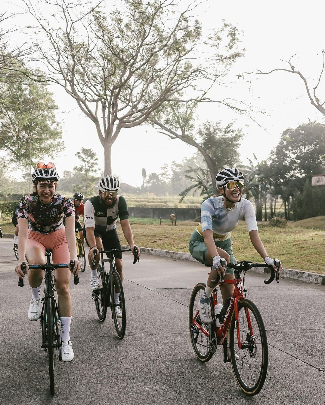 a group of people cycling with Ghia Vicente of San Ride Bukas