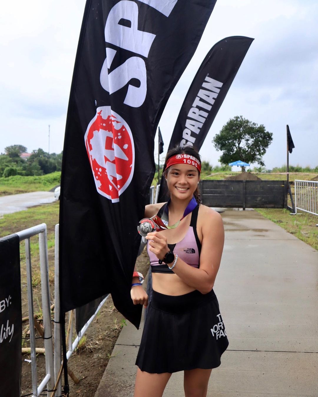 Filipina athlete Kaizen Dela Serna competing in a Spartan Race