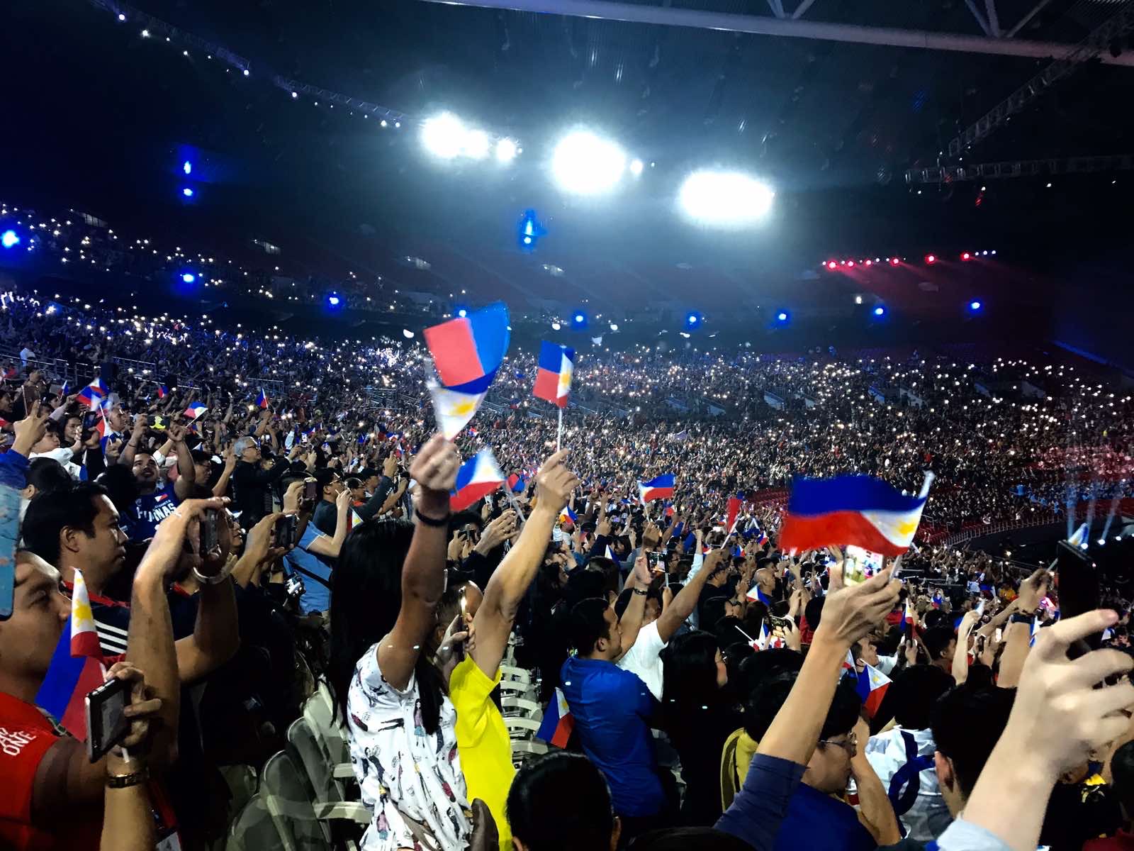 Filipino sports fans cheering on Team Philippines in Southeast Asian Games