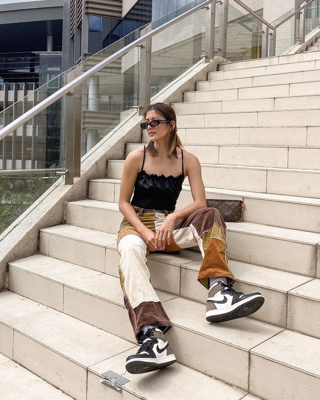 Kim Kianna Dy wearing Air Jordan 1s in'Dark Mocha'