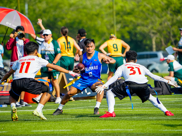 Aaron Velasquez playing flag football in Manila