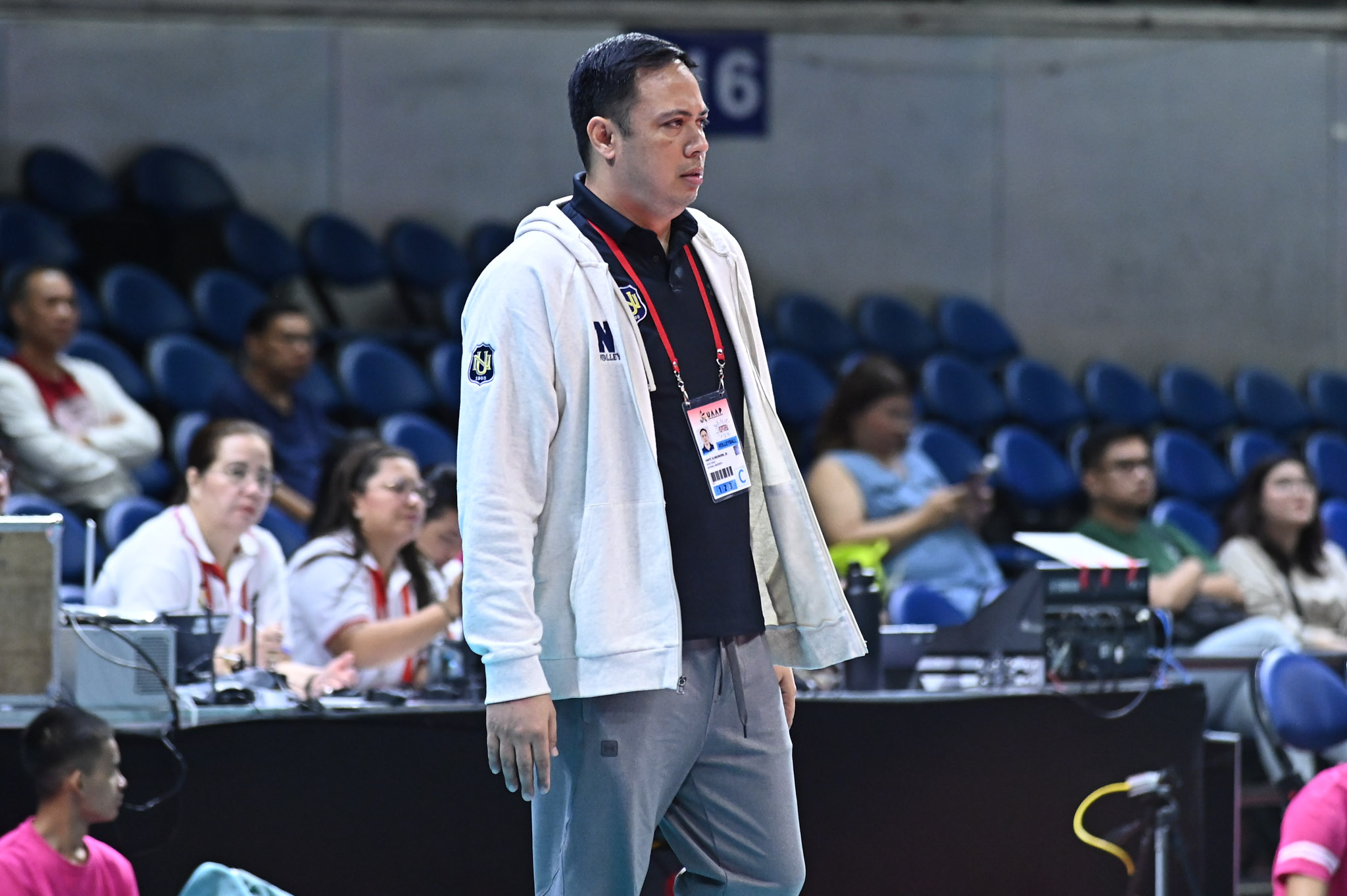 One of the volleyball coaches on double duty Dante Alinsunurin.