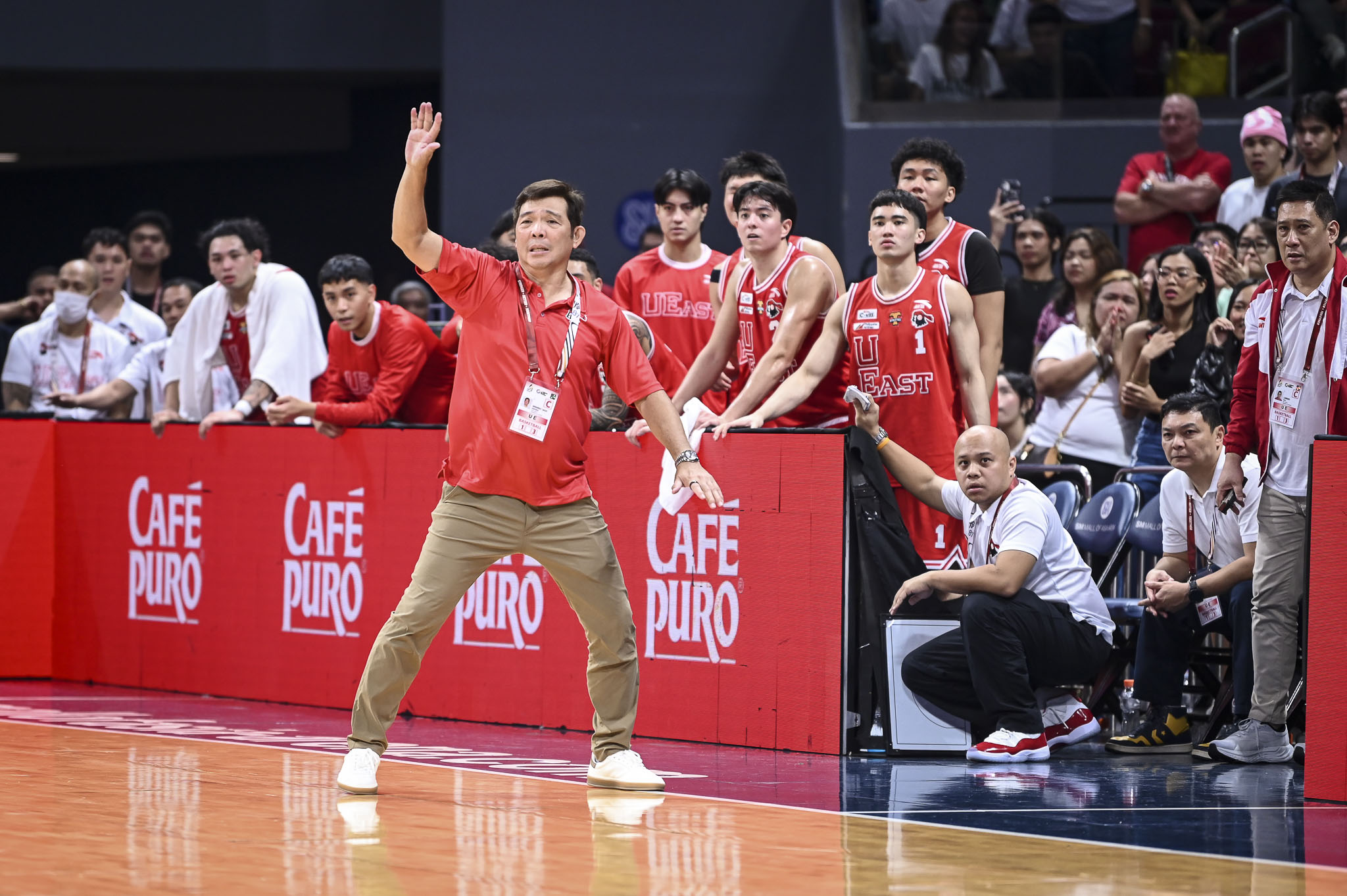 Jack Santiago coaching the UE Red Warriors.
