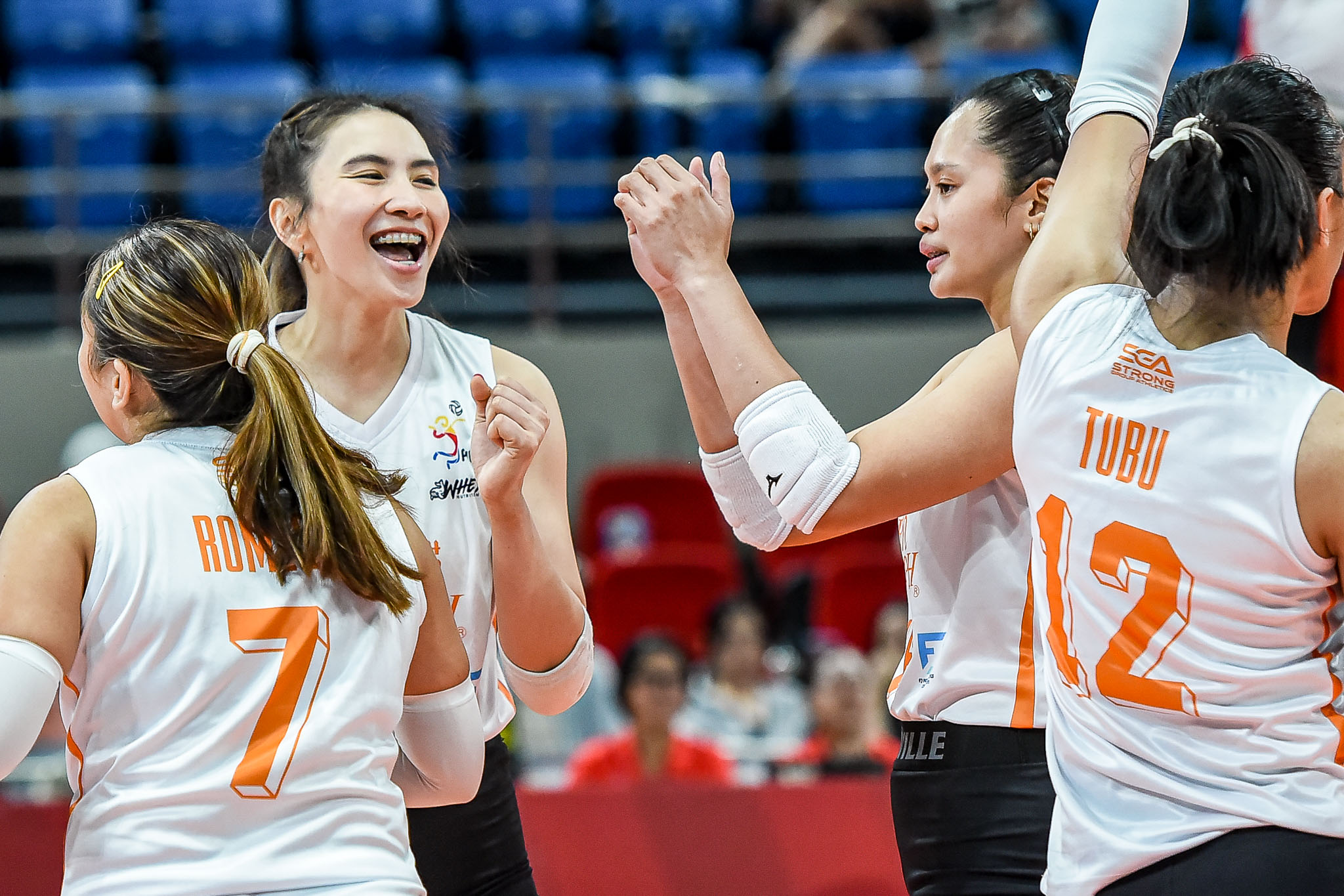 Rachel Anne Daquis with her new Farm Fresh teammates.