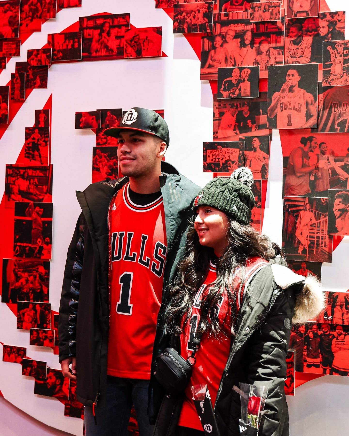 Bulls-fans-logo-resized - the game Bulls fans pose in a separate section of the Derrick Rose experience, which features his iconic logo recreated with action shots.