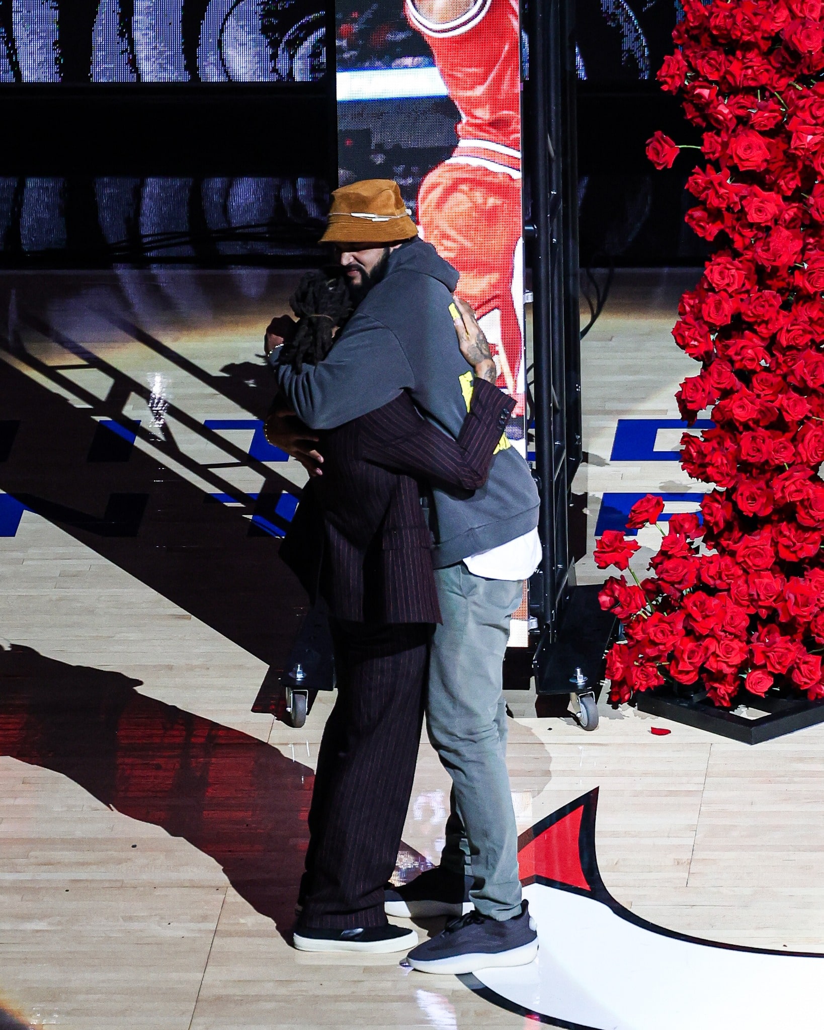 Derrick-rose-joakim-noah-hug-resized - the game Derrick Rose and longtime teammate Joakim Noah share a special hug