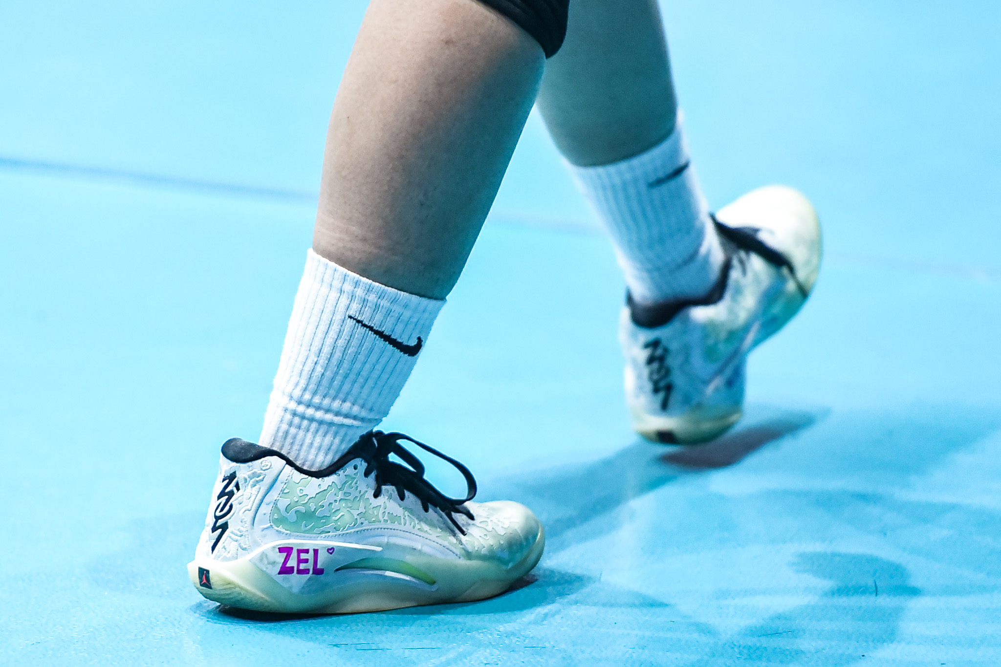 Uaap 87 wvb nu vs admu - -3458 - the game Another Blue Eagle writes "Zel" for Tsunashima on her own sneaker.