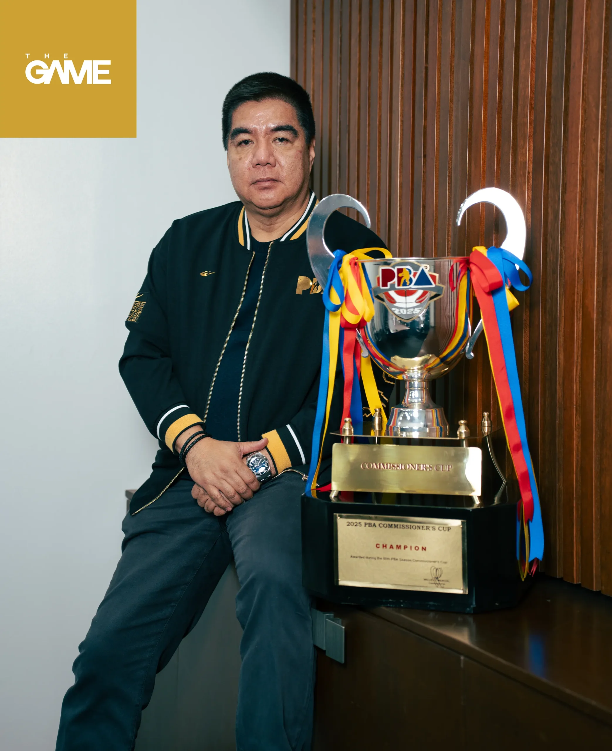 Willie Marcial poses with the PBA Commissioner's Cup trophy, which was eventually won by TNT