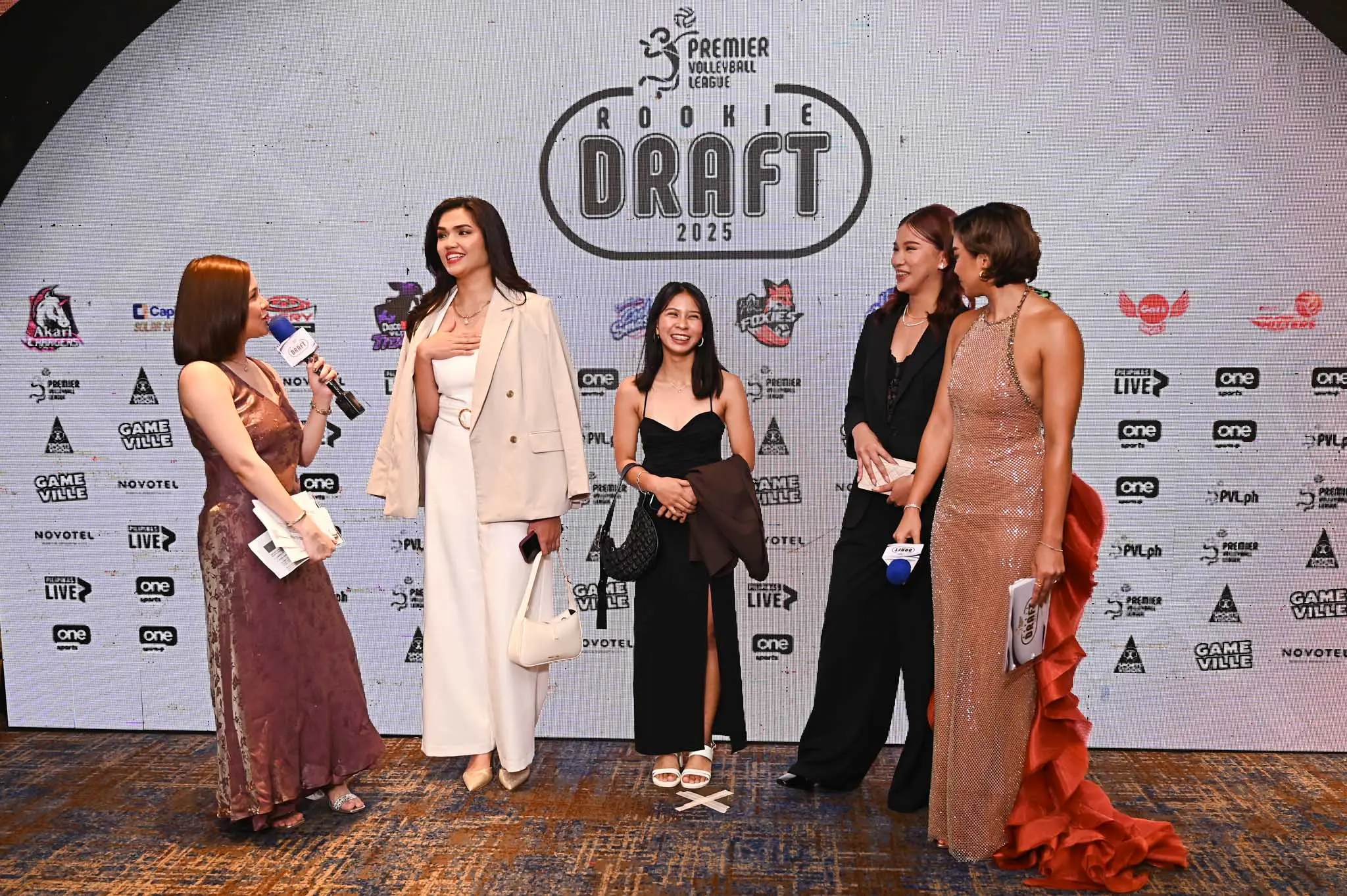 Sheena Toring with former NU teammates Pearl Denura and Erin Pangilinan at the impromptu red carpet