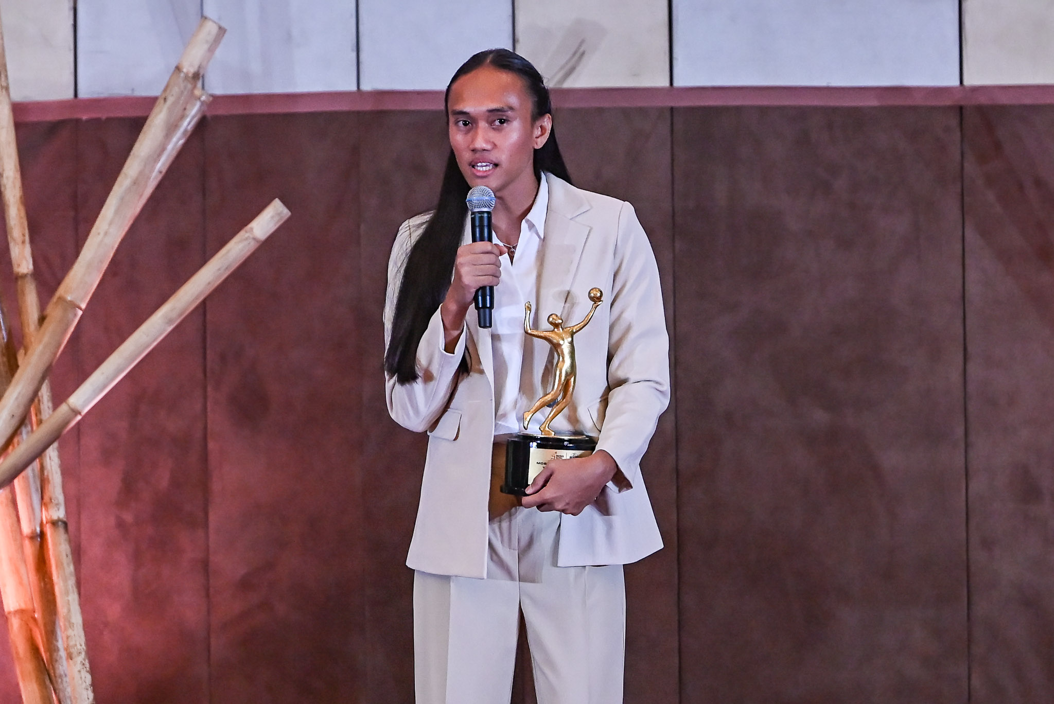 Trisha Tubu with her MVP trophy