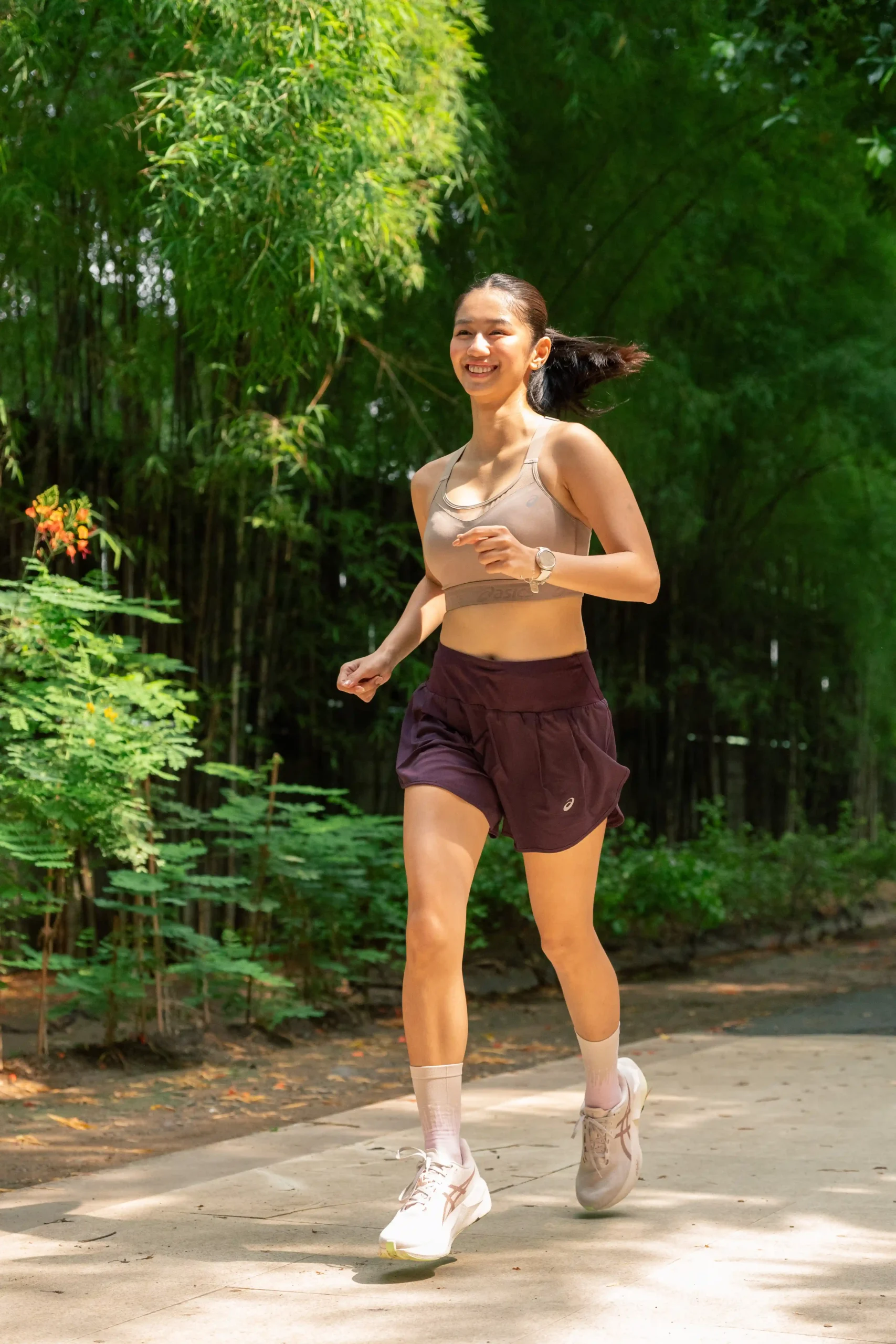 Asics-inart - the game A runnner dressed in Asics apparel and running shoes