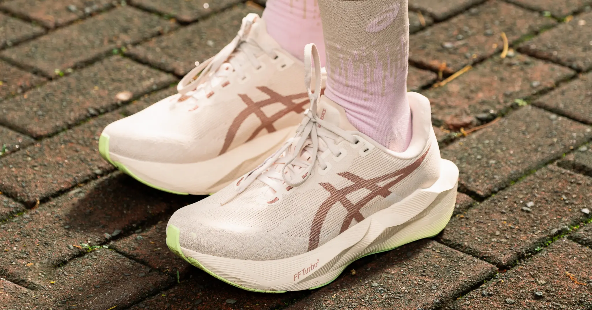 A closeup image of an Asics running shoe